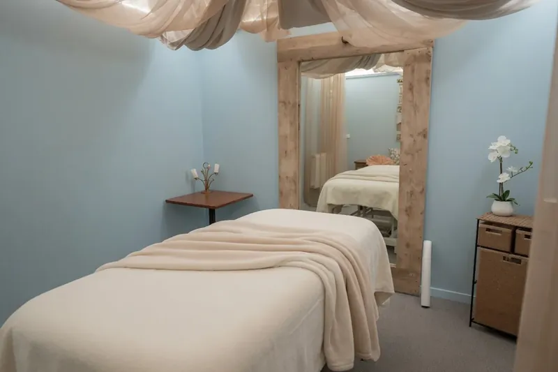 The blue tantric room at The Workshop, with two massage tables