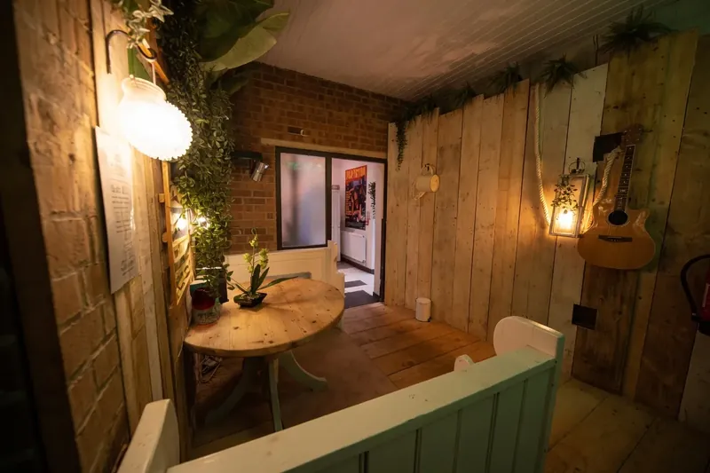 The relaxation area at The Workshop, with the round table and seating