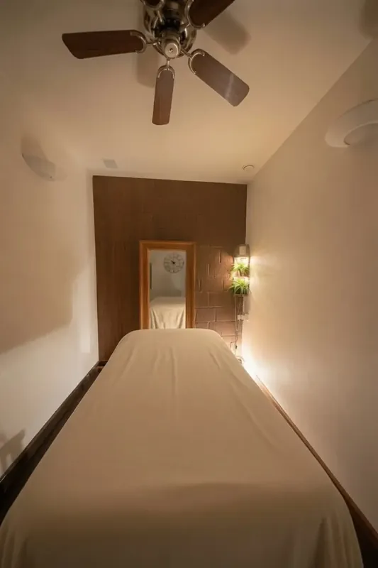 The fourth tantric room at The Workshop, with a single massage table